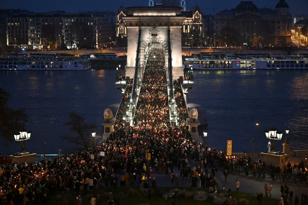 Tens of thousands are marching from downtown Budapest across the Chain Bridge and tunnel up to Buda Castle, where Viktor Orbán’s office is. Opposition leader Péter Magyar called the march to protest child abuse by Hungarian authorities—and the government’s inaction